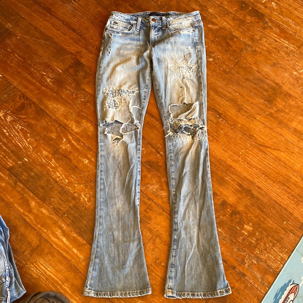 Heavily distressed joes micro flare